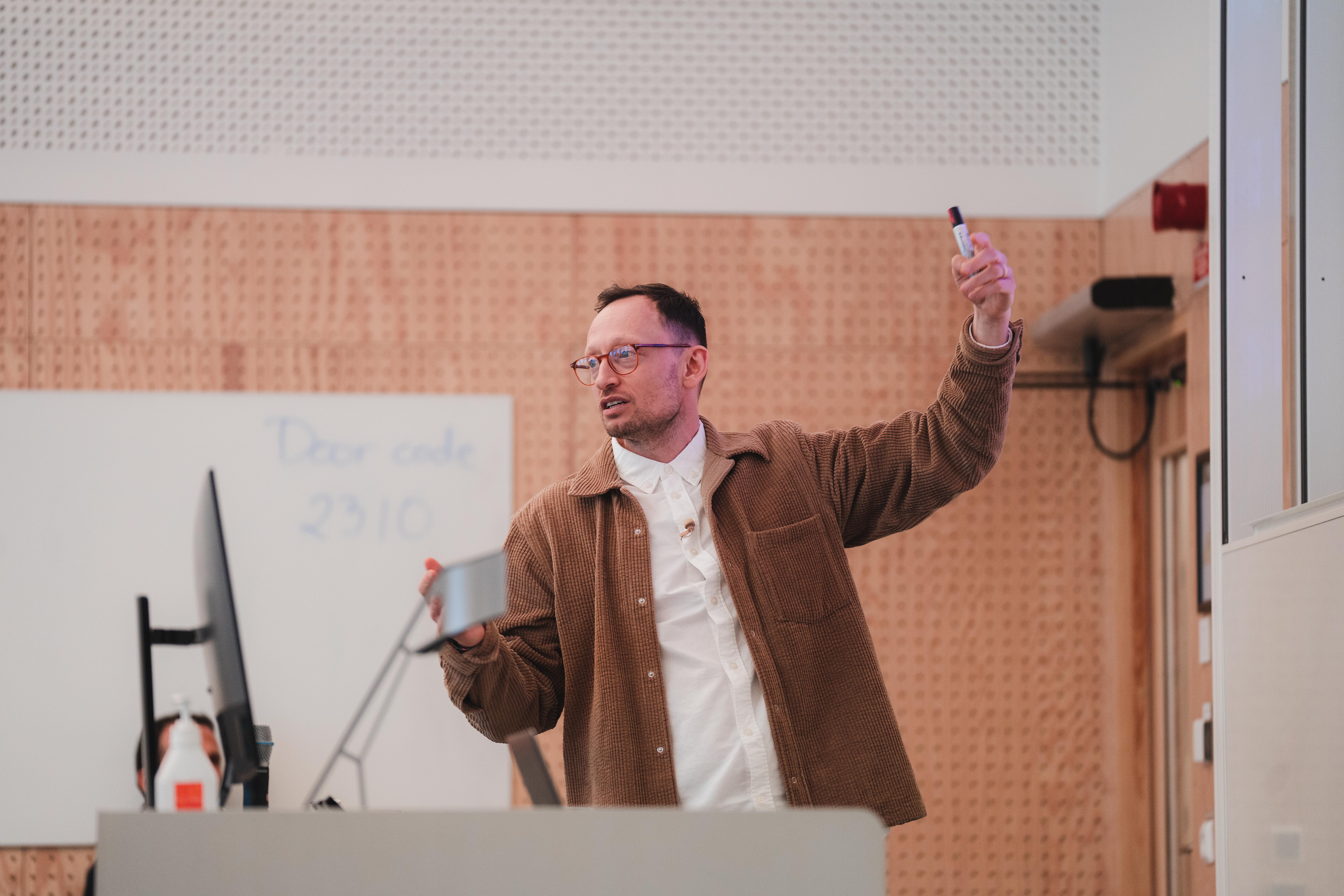 Jacob Naish presenting to a workshop room